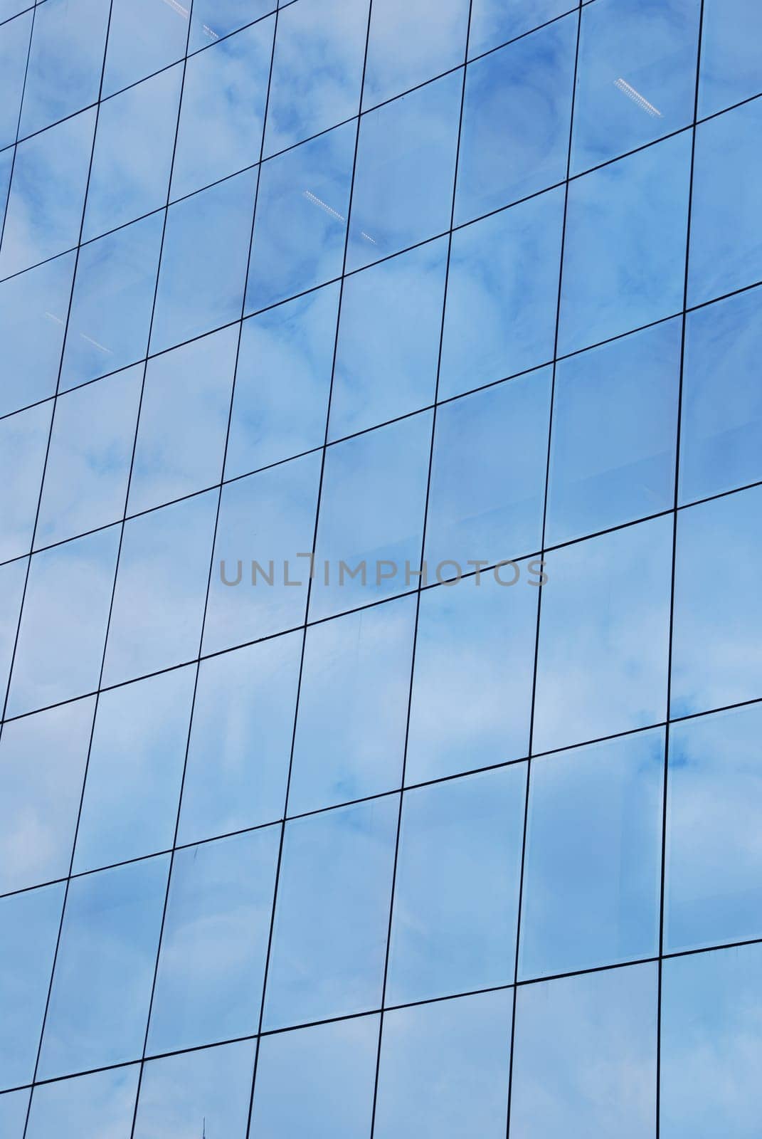 modern office building facade with glass pattern