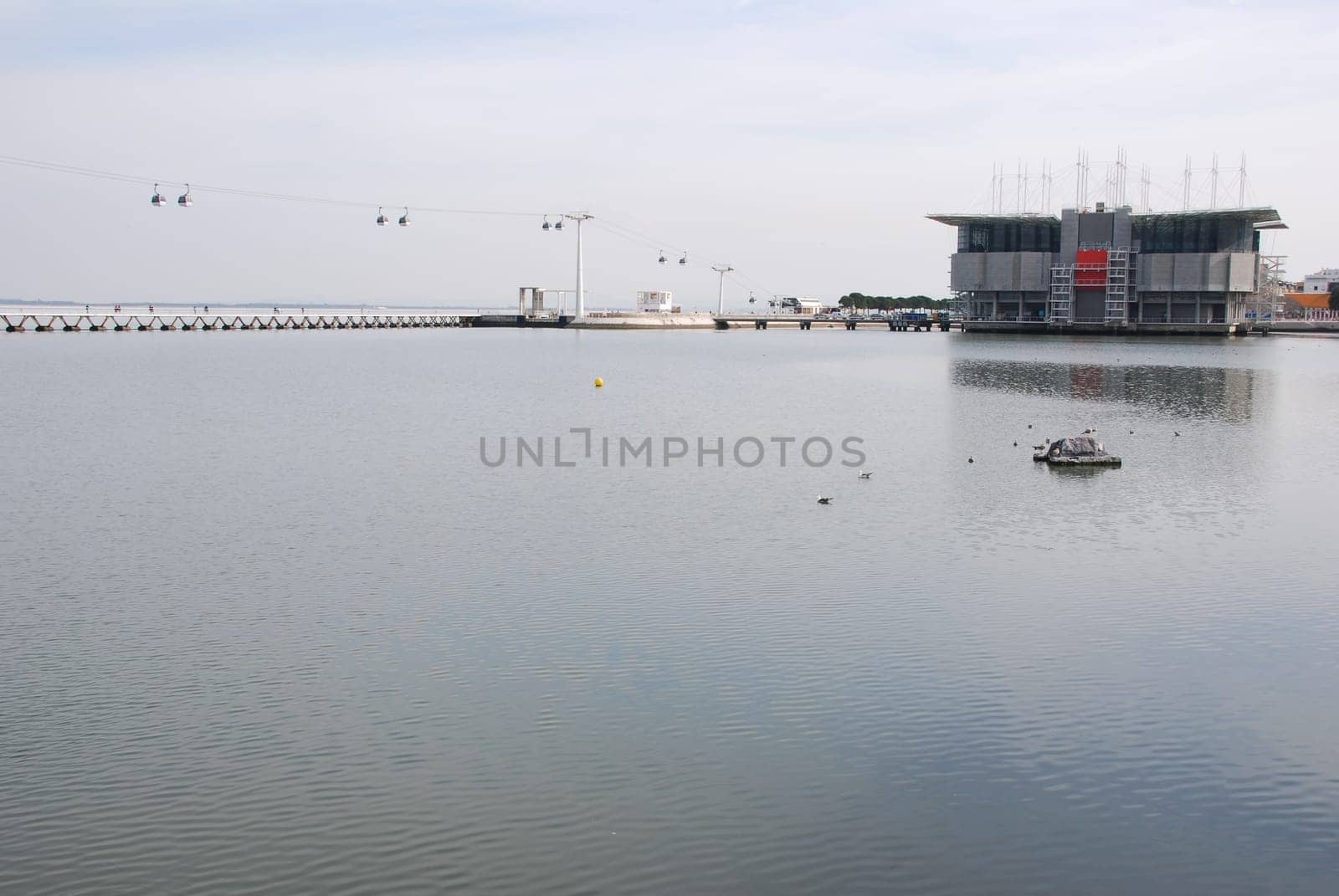 LISBON - MARCH 22: modern Oceanarium building in Nations Park at Lisbon, Portugal on March 22, 2010 - Lisbon, Portugal