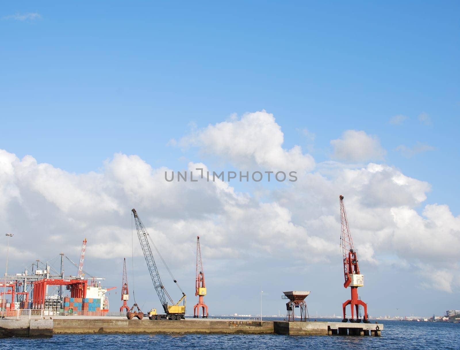 beautiful view to Lisbon&#039 s shipyard along the Tagus river (Portugal)