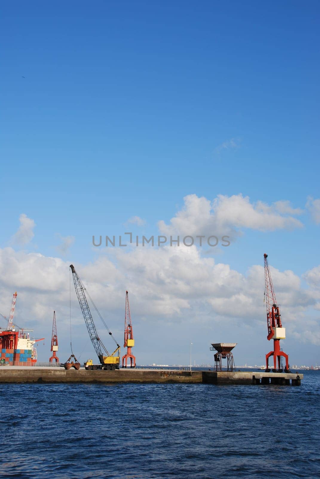 beautiful view to Lisbon&#039 s shipyard along the Tagus river (Portugal)