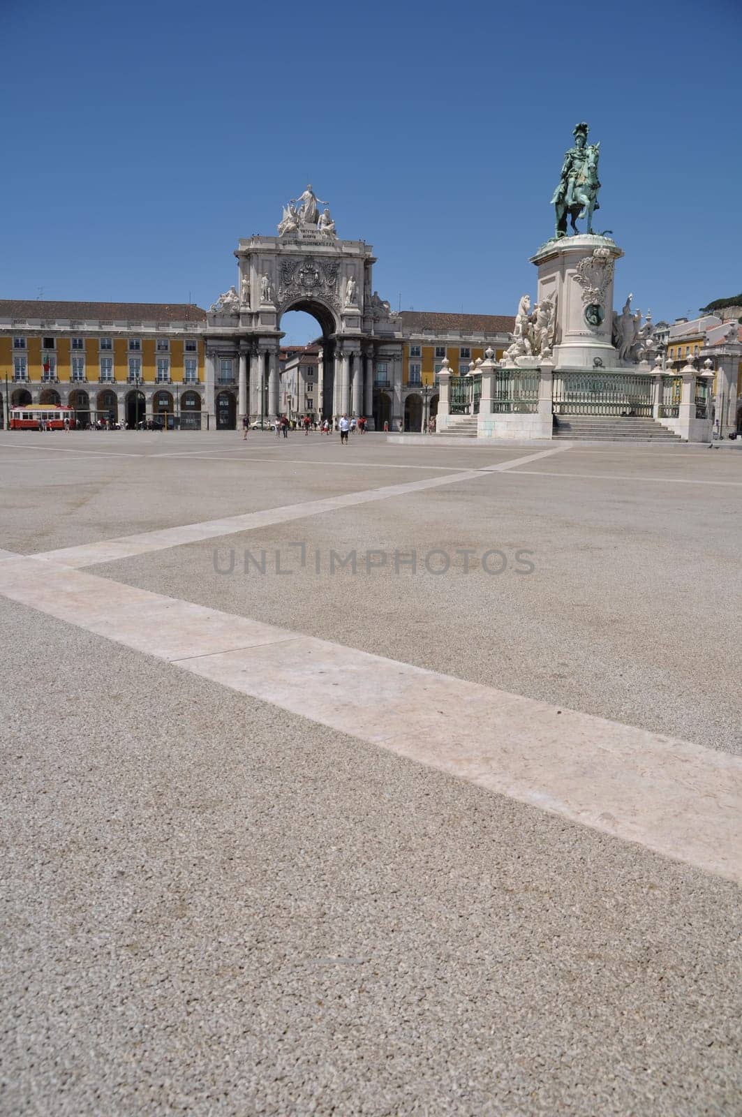 famous Commerce Square also known as Terreiro do Paço in Lisbon, Portugal (statue of King José I in the center)