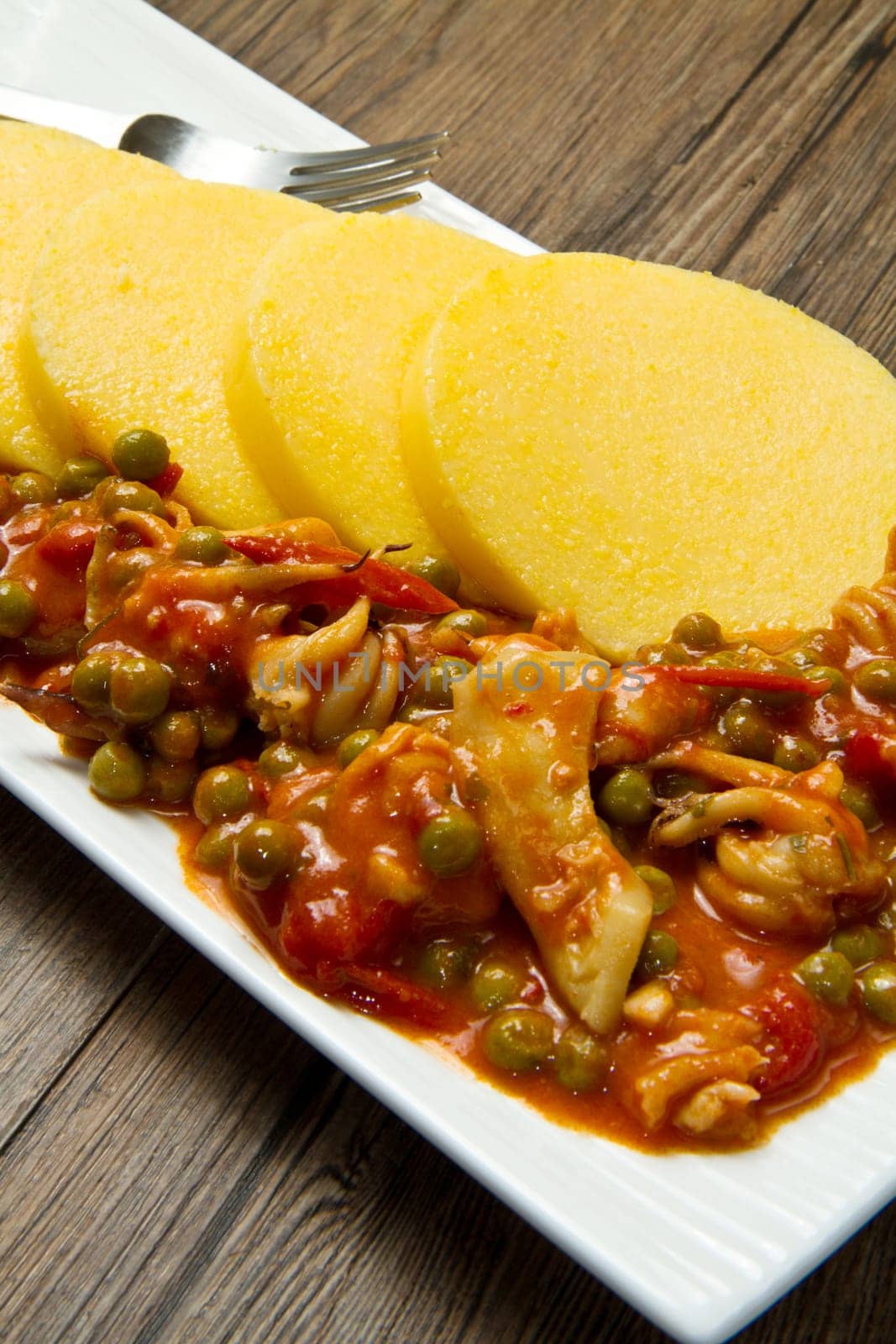 polenta with cuttlefish and peas