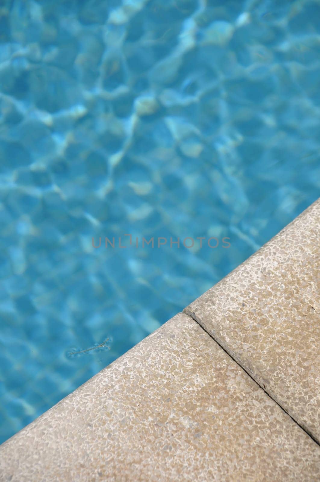 blue and vibrant swimming pool side