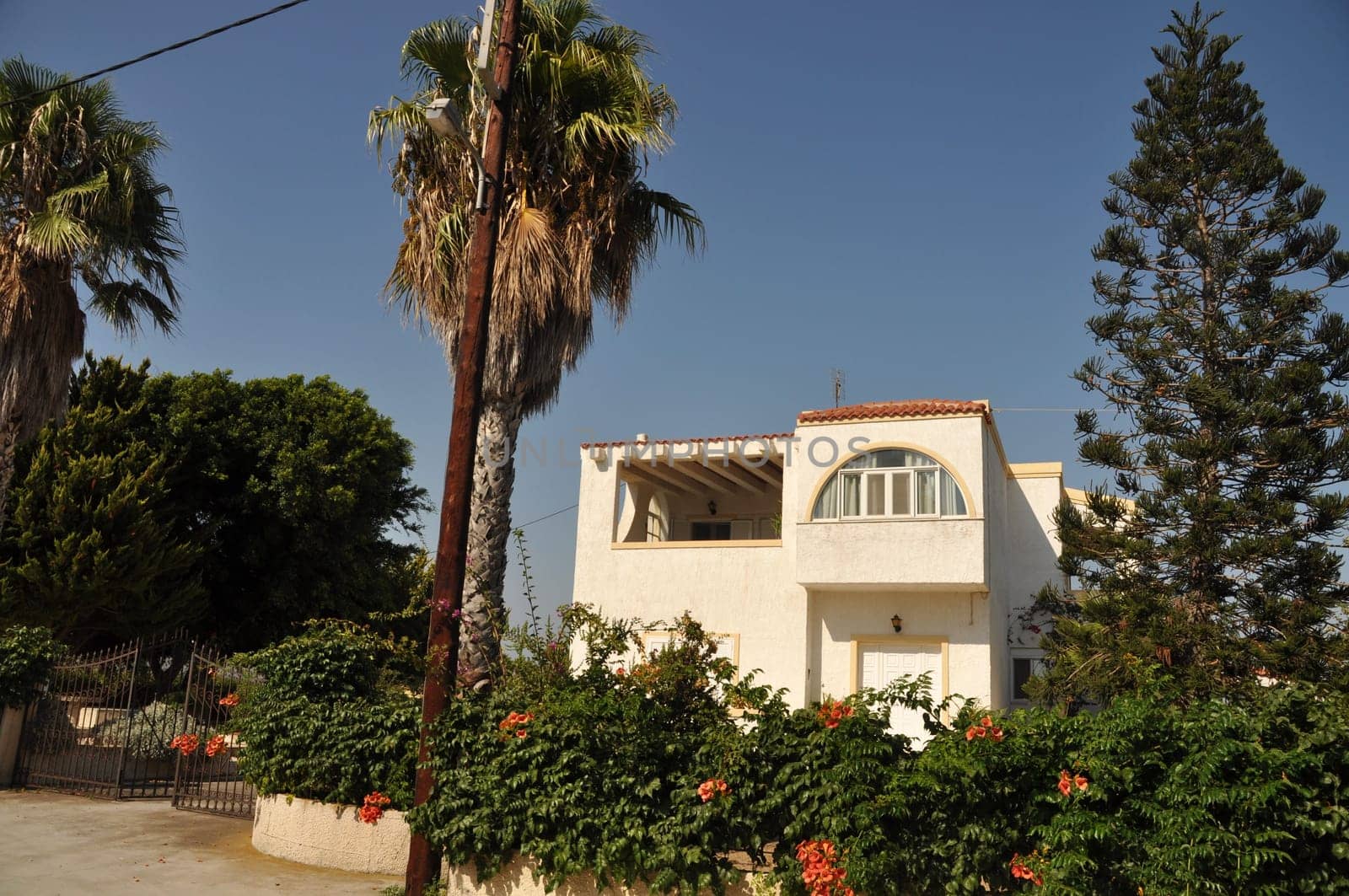 gorgeous greek house with lovely garden (sunset picture)