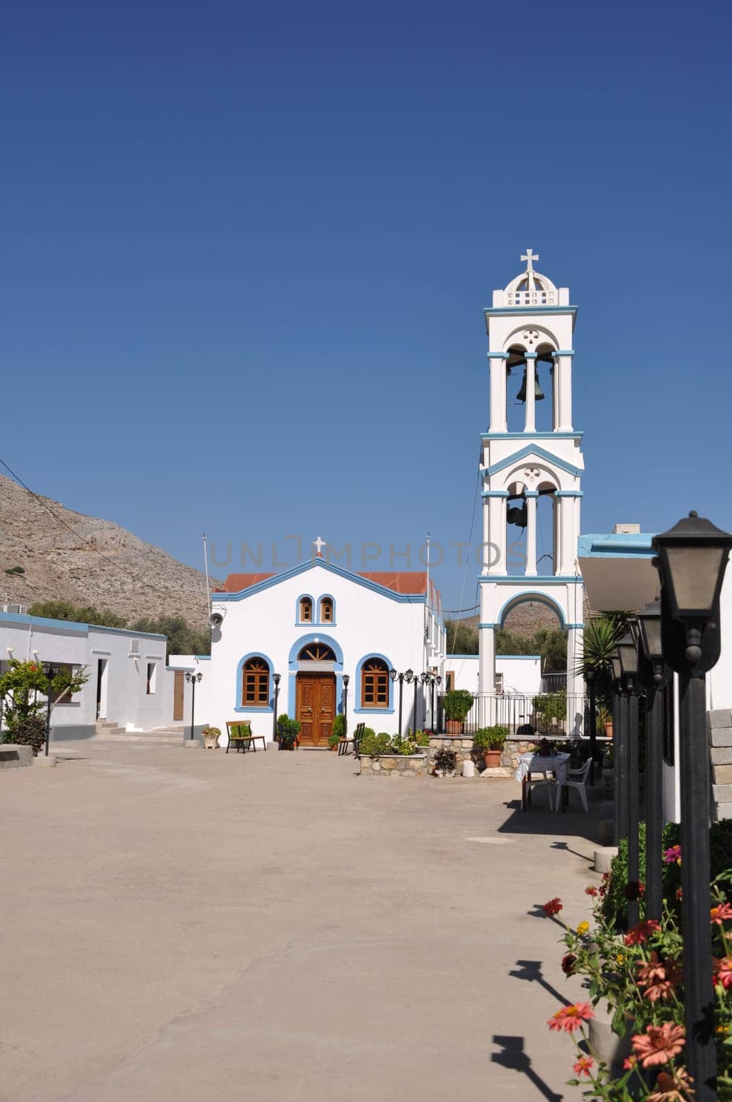 beautiful blue and white church/tower in Pserimos island, Greece (gorgeous blue sky)