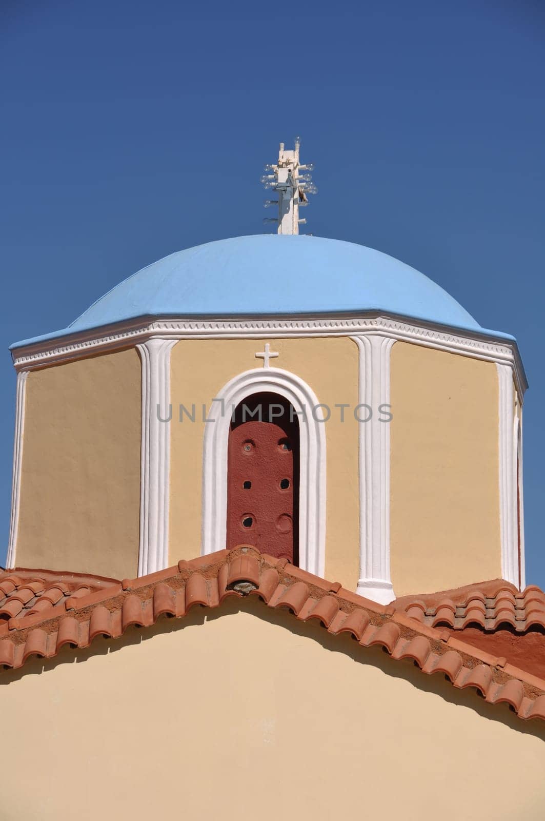 typical greek church in Zia village (Kos island), Greece (gorgeous blue sky)