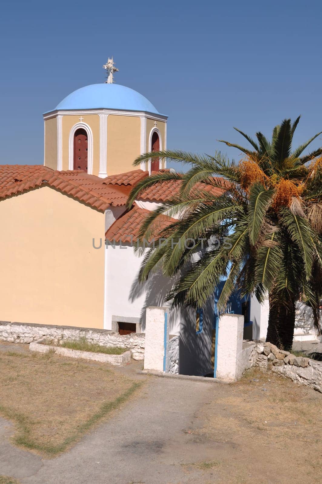typical greek church in Zia village (Kos island), Greece (gorgeous blue sky)