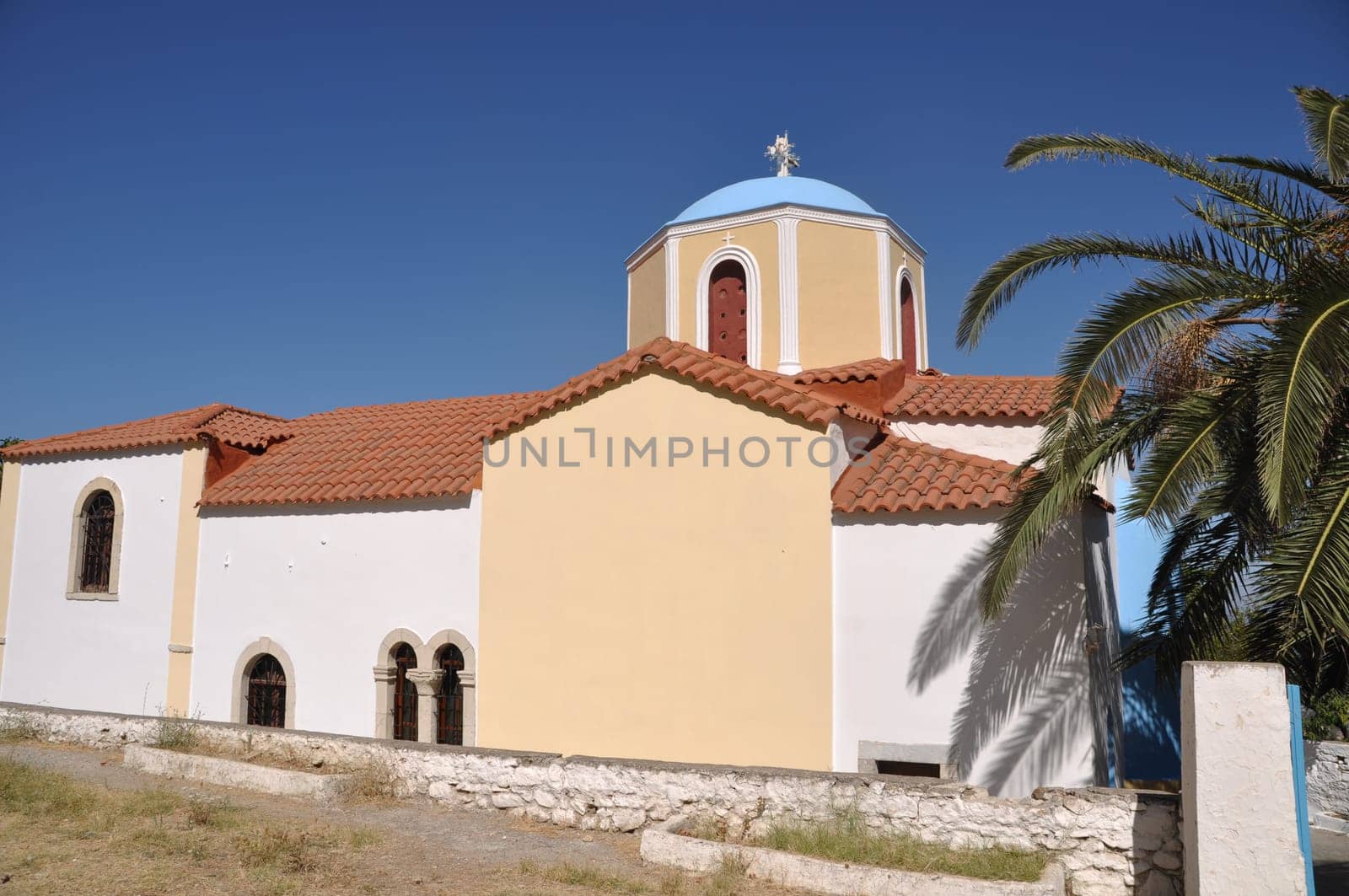 typical greek church in Zia village (Kos island), Greece (gorgeous blue sky)