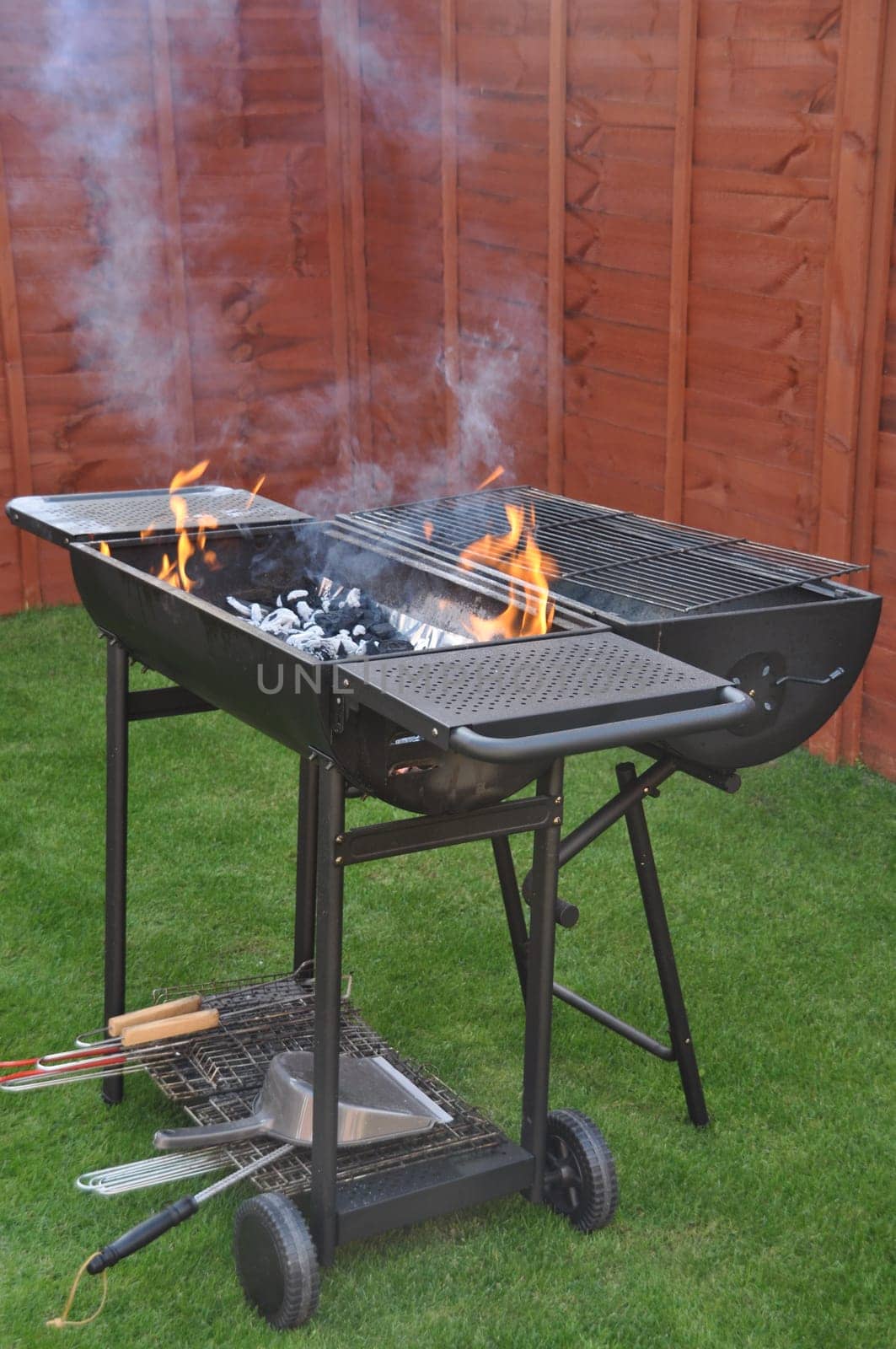 black barbecue grill on a outdoor house garden