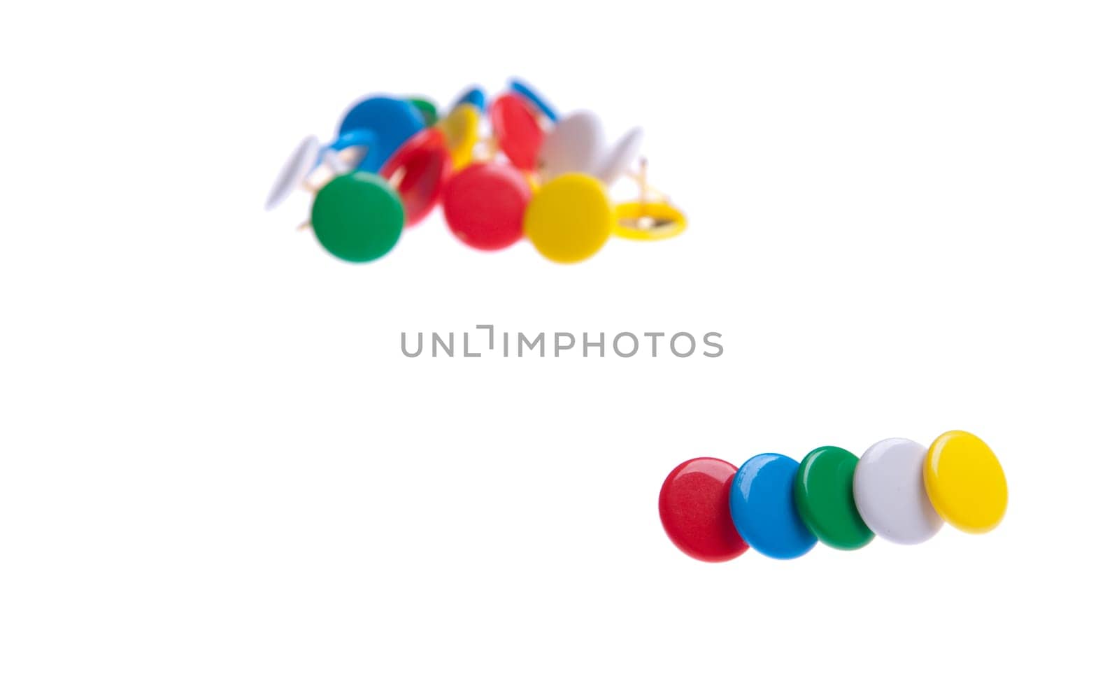 colored push pins isolated on white background (shallow depth of field)