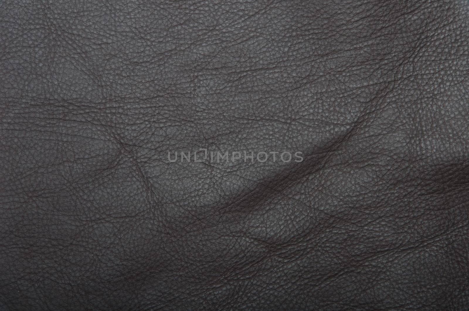 gorgeous brown leather scrap background or texture