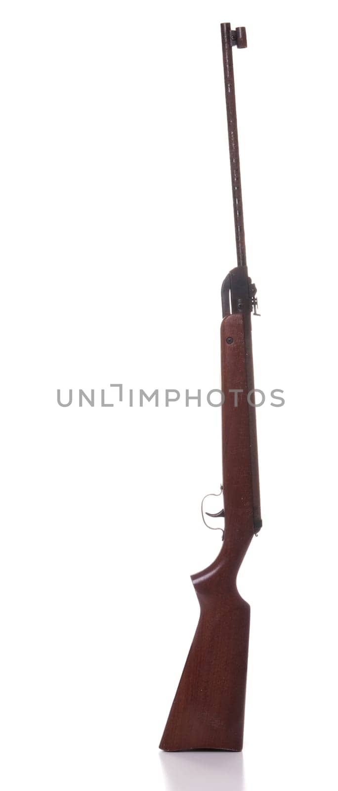 rusty pneumatic air rifle isolated on white background