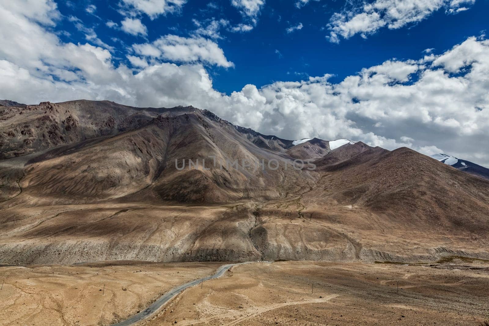 Road in Himalayas near Kardung La pass. Ladakh, India by dimol