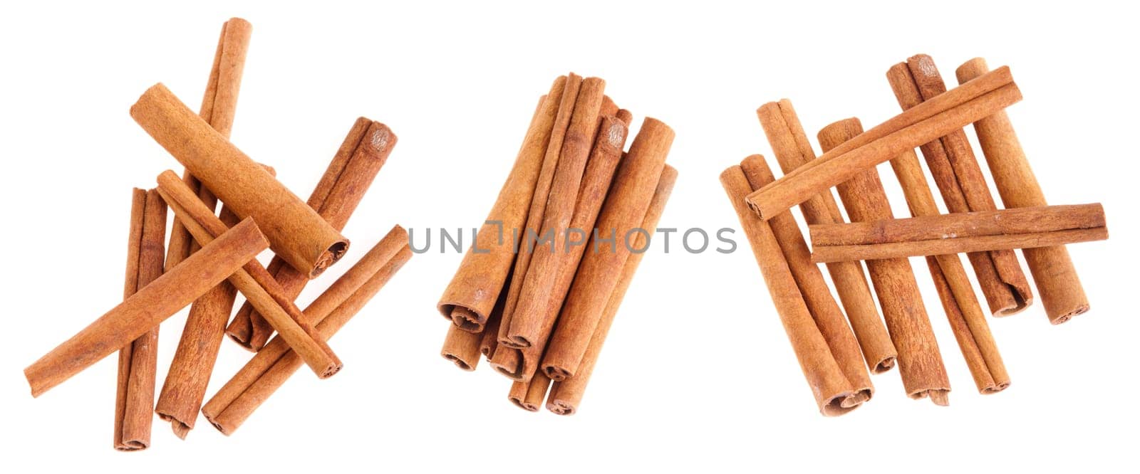 collection of cinnamon sticks isolated on white background