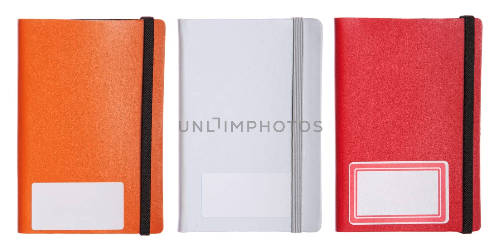 collection of three colorful notebooks, diary or agenda (isolated on white background)