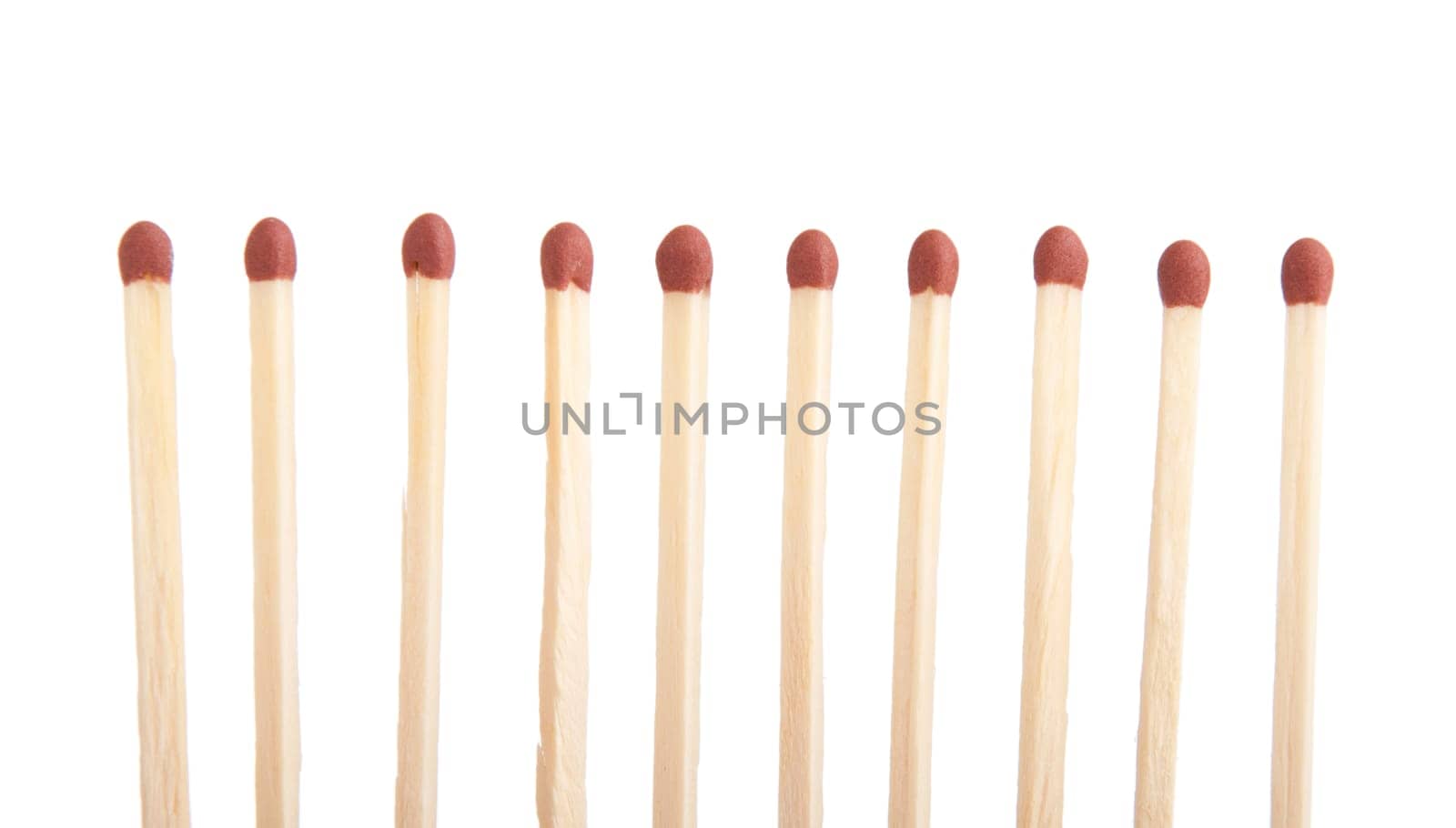 group of whole brown matches (isolated on a white background)