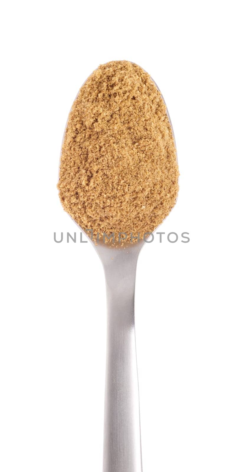 coriander spice on a stainless steel spoon, isolated on white background