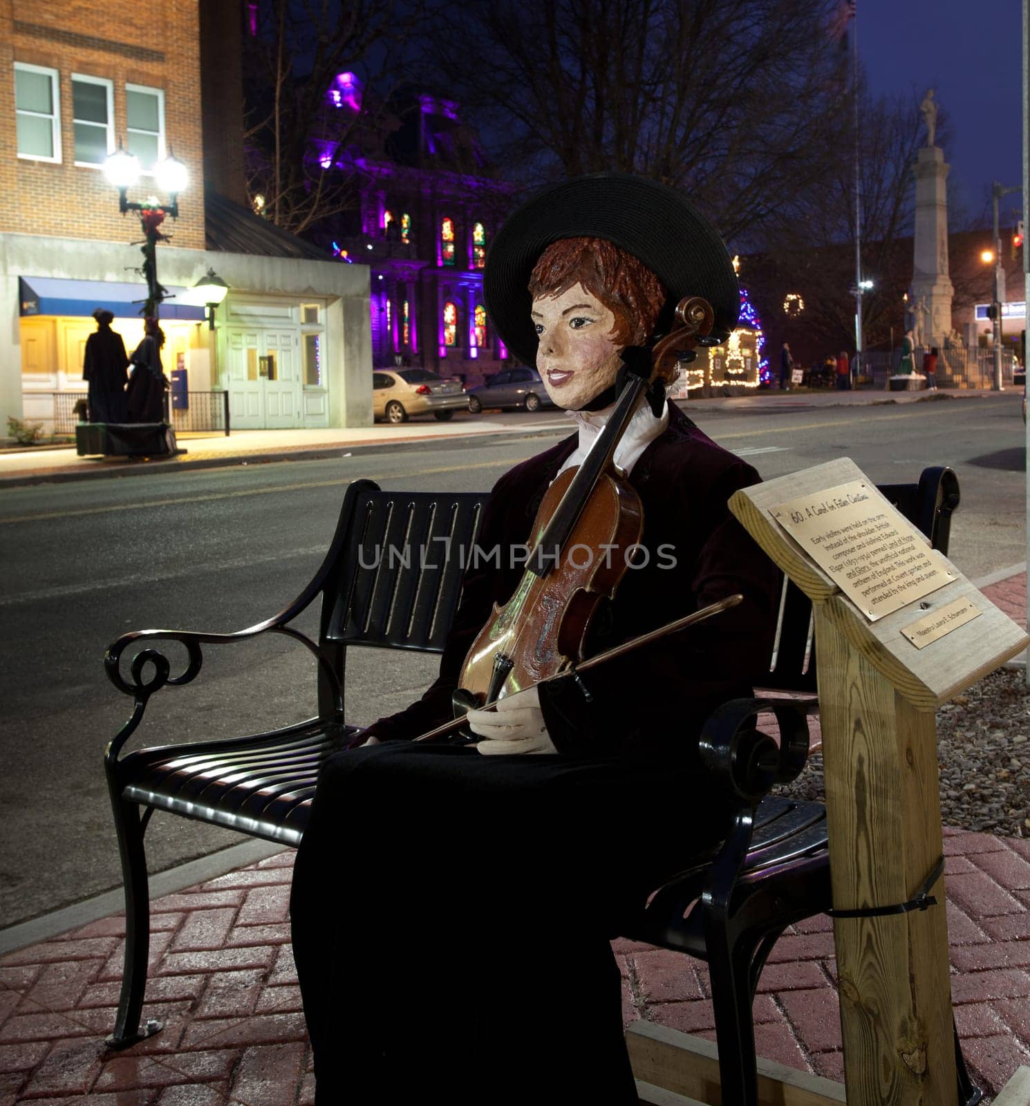 CAMBRIDGE, OHIO - NOVEMBER 24: Violinist in the high street in Cambridge Ohio on November 24, 2011. This annual event uses Dickens characters on the main street.