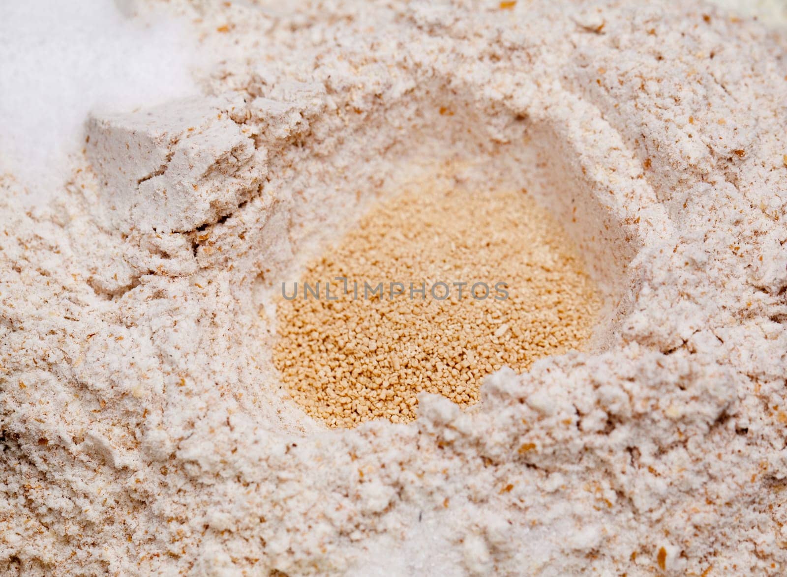 Bread making machine with ingredients prepared for mixing