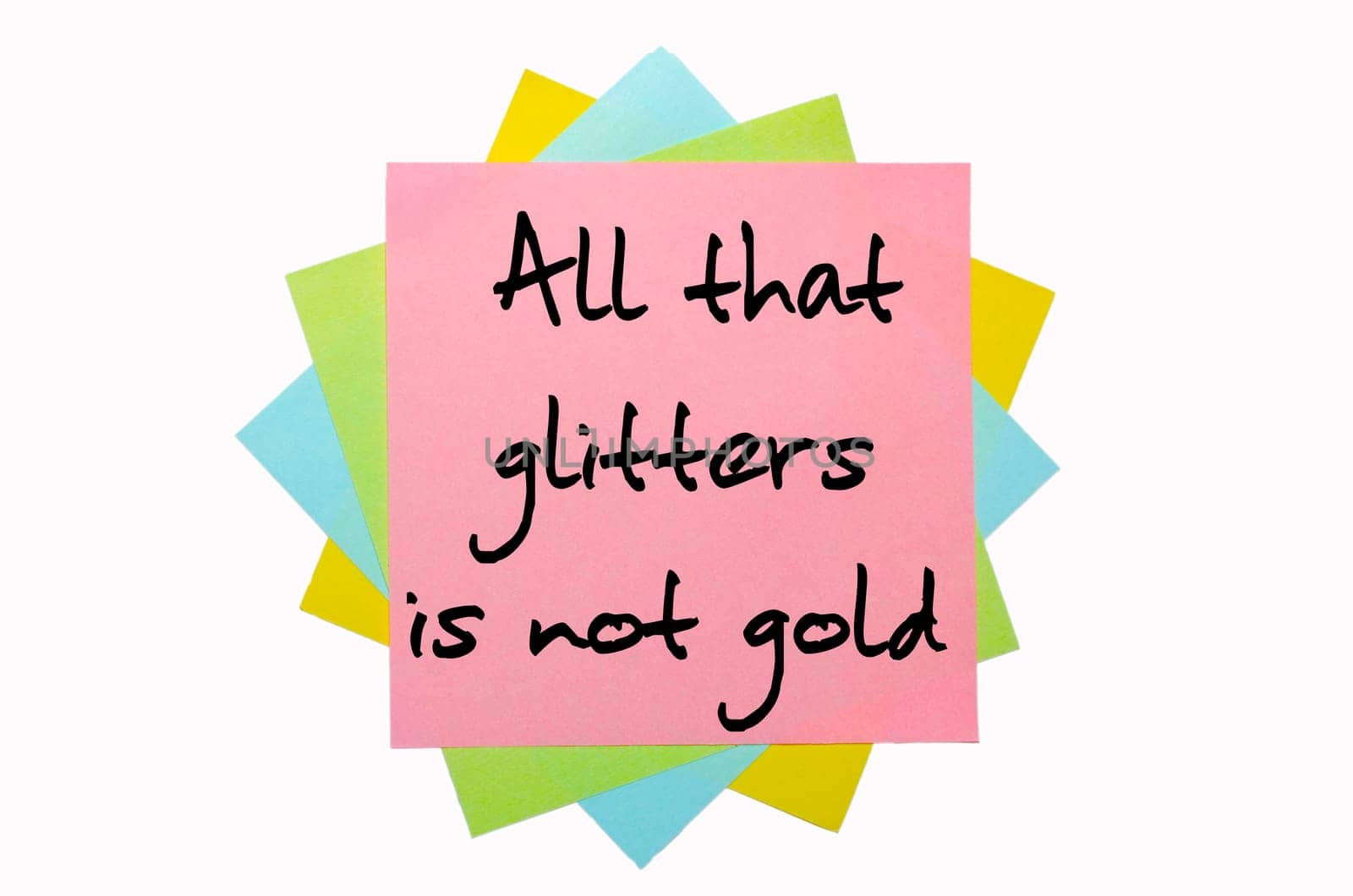 text "All that glitters is not gold"" written by hand font on bunch of colored sticky notes"