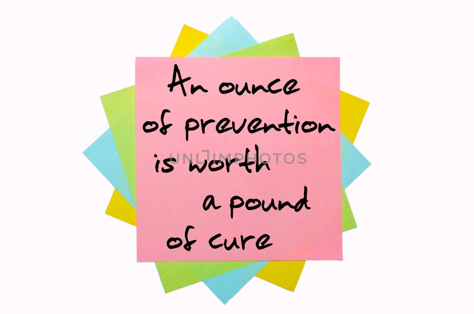 text "An ounce of prevention is worth a pound of cure"" written by hand font on bunch of colored sticky notes"