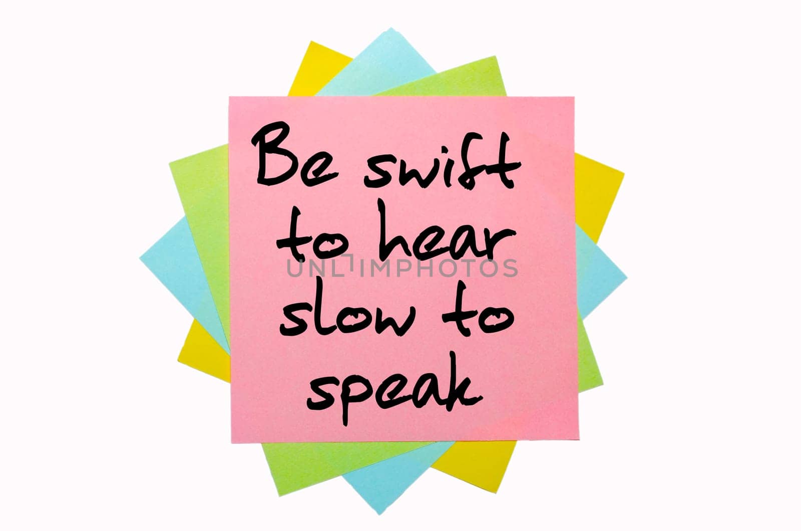 text "Be swift to hear, slow to speak"" written by hand font on bunch of colored sticky notes"