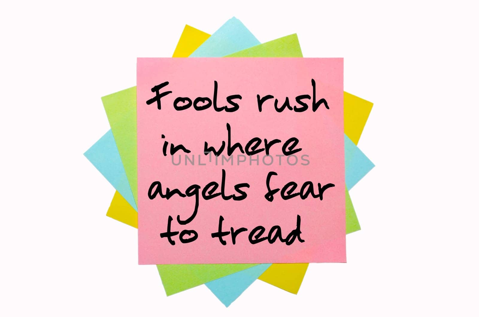 text "  Fools rush in where angels fear to tread "" written by hand font on bunch of colored sticky notes"