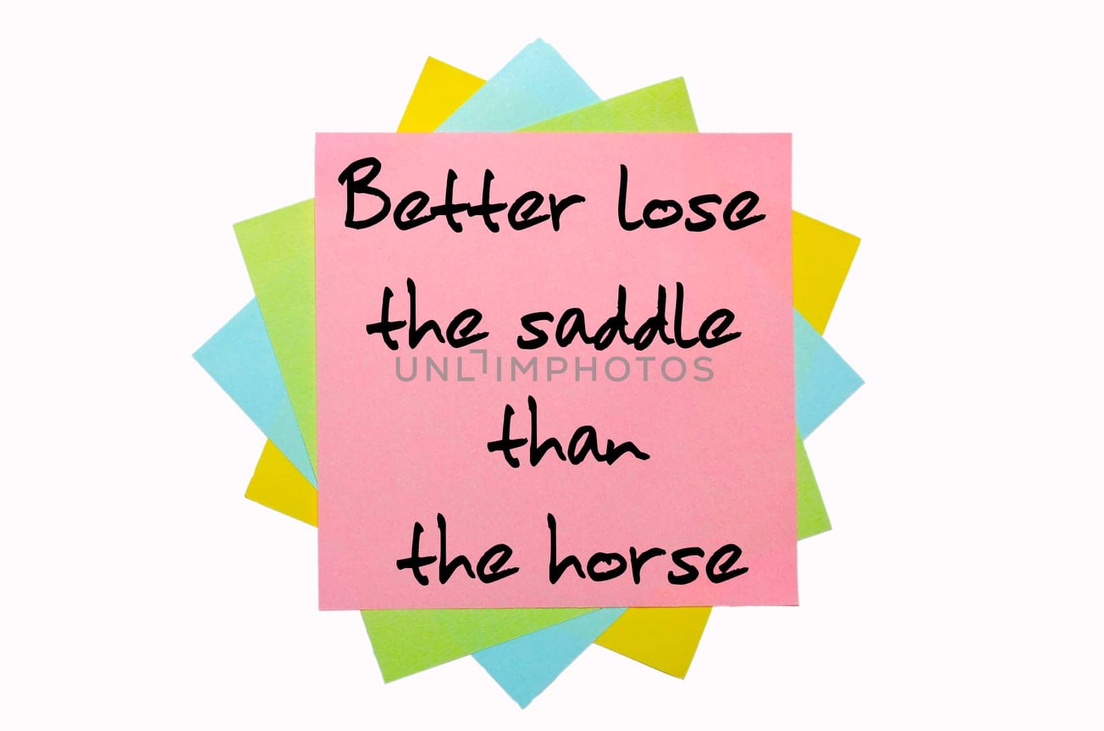 text "Better lose the saddle than the horse"" written by hand font on bunch of colored sticky notes"