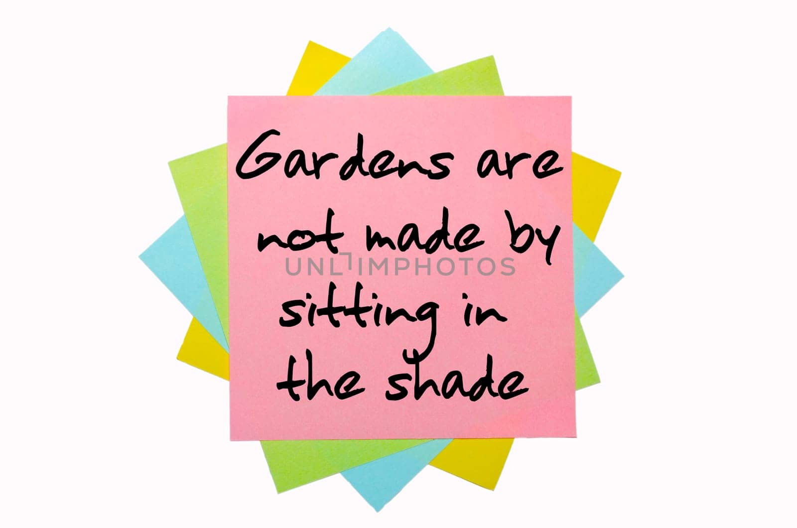 text "  Gardens are not made by sitting in the shade "" written by hand font on bunch of colored sticky notes"