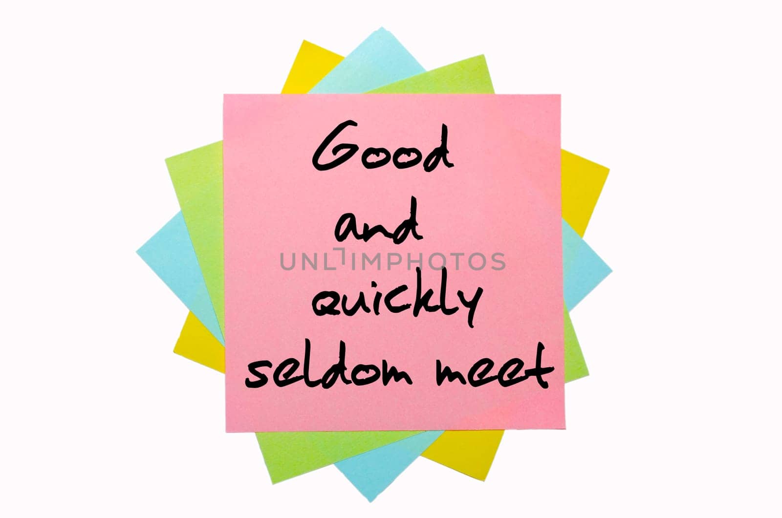 text "  Good and quickly seldom meet "" written by hand font on bunch of colored sticky notes"