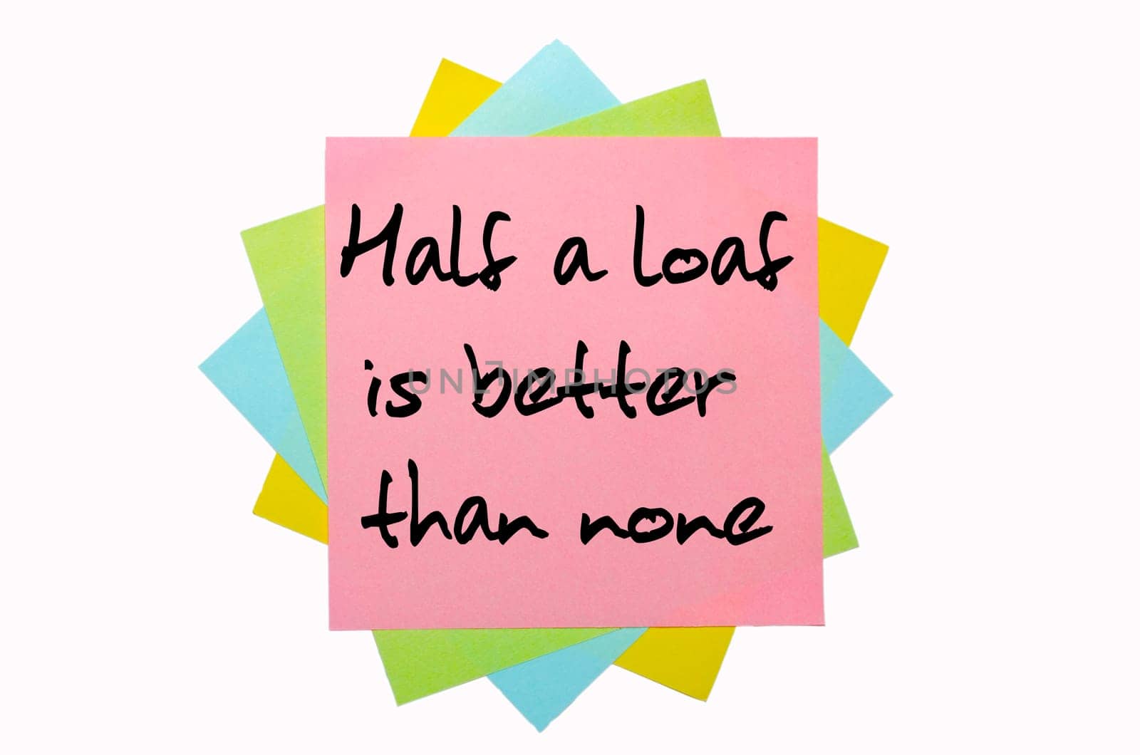 text "  Half a loaf is better than none "" written by hand font on bunch of colored sticky notes"
