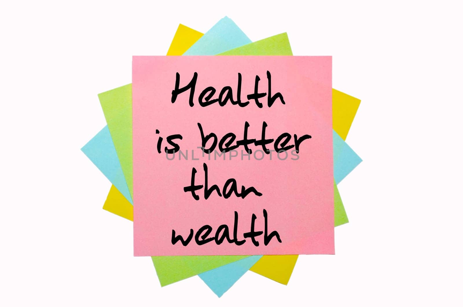 text "  Health is better than wealth "" written by hand font on bunch of colored sticky notes"