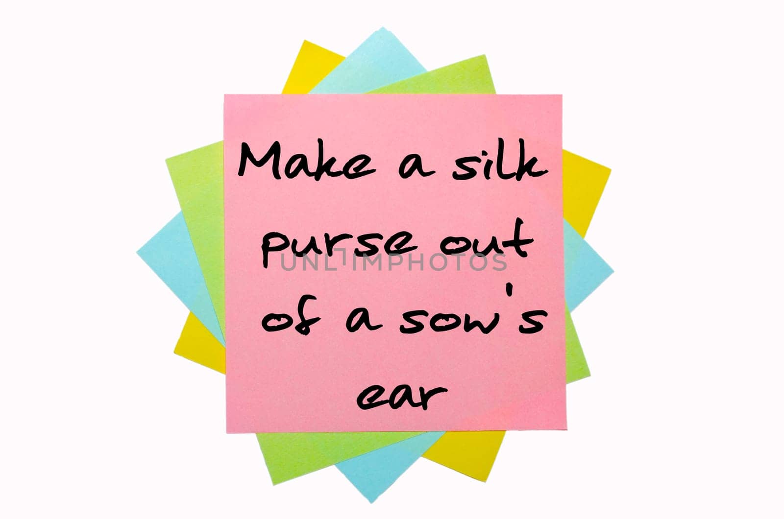 text "Make a silk purse out of a sow&#039 s ear"" written by hand font on bunch of colored sticky notes"
