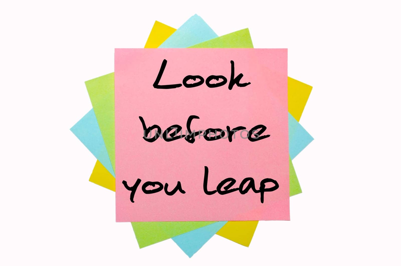 text "Look before you leap"" written by hand font on bunch of colored sticky notes"