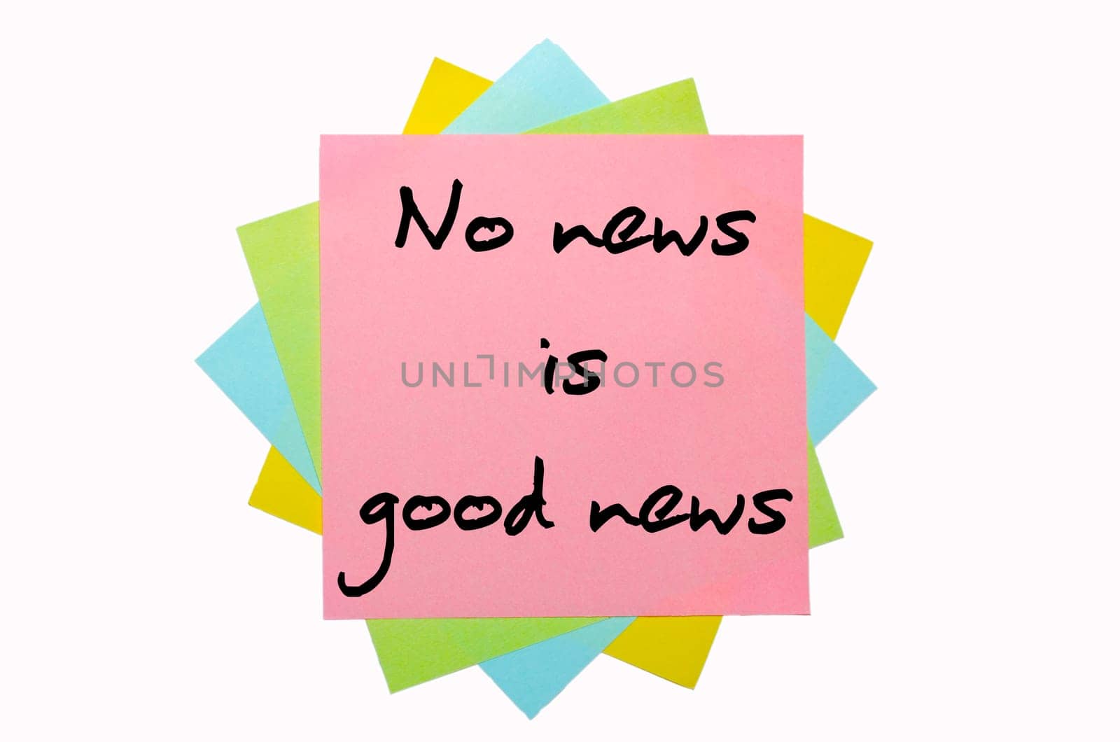 text " No news is good news "" written by hand font on bunch of colored sticky notes"