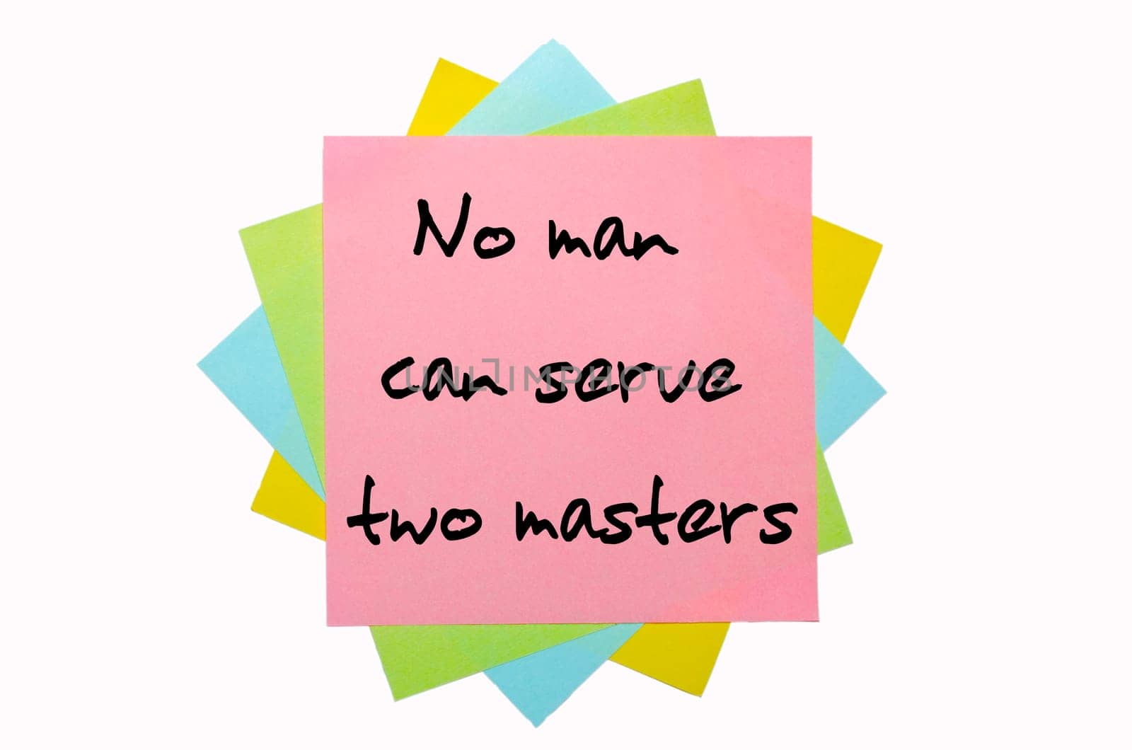text " No man can serve two masters "" written by hand font on bunch of colored sticky notes"