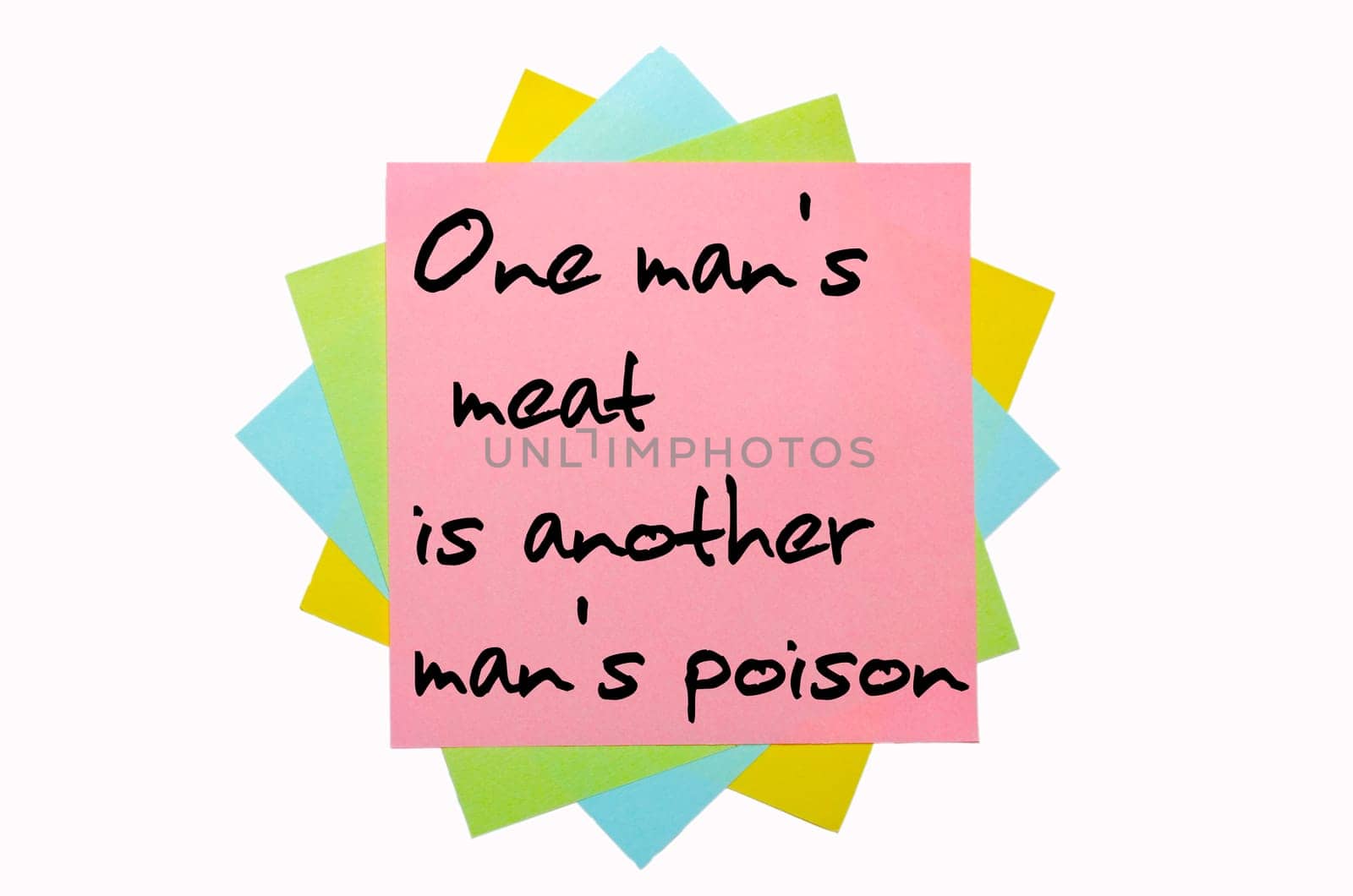 text " One man&#039 s meat is another man&#039 s poison "" written by hand font on bunch of colored sticky notes"