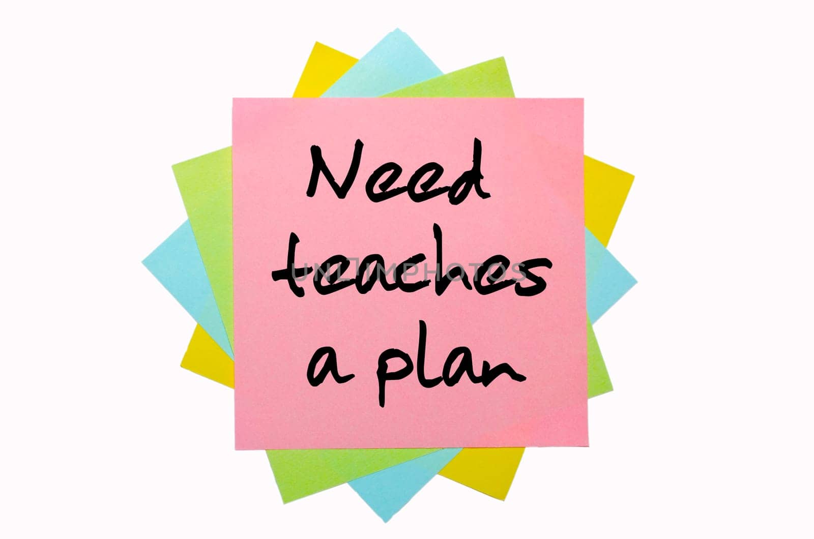 text " Need teaches a plan "" written by hand font on bunch of colored sticky notes"