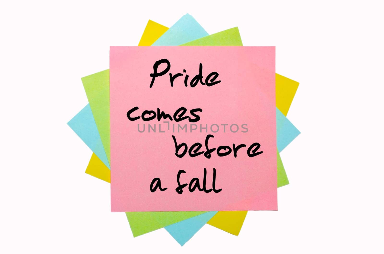 text " Pride comes before a fall "" written by hand font on bunch of colored sticky notes"