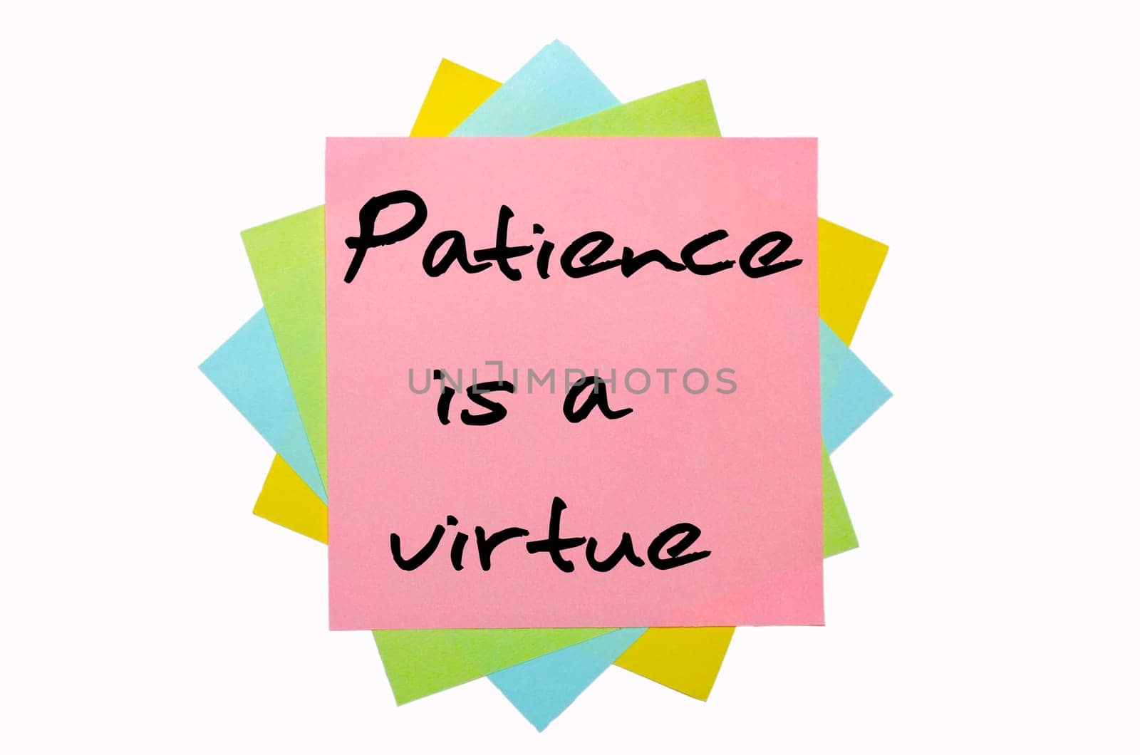 text "Patience is a virtue"" written by hand font on bunch of colored sticky notes"
