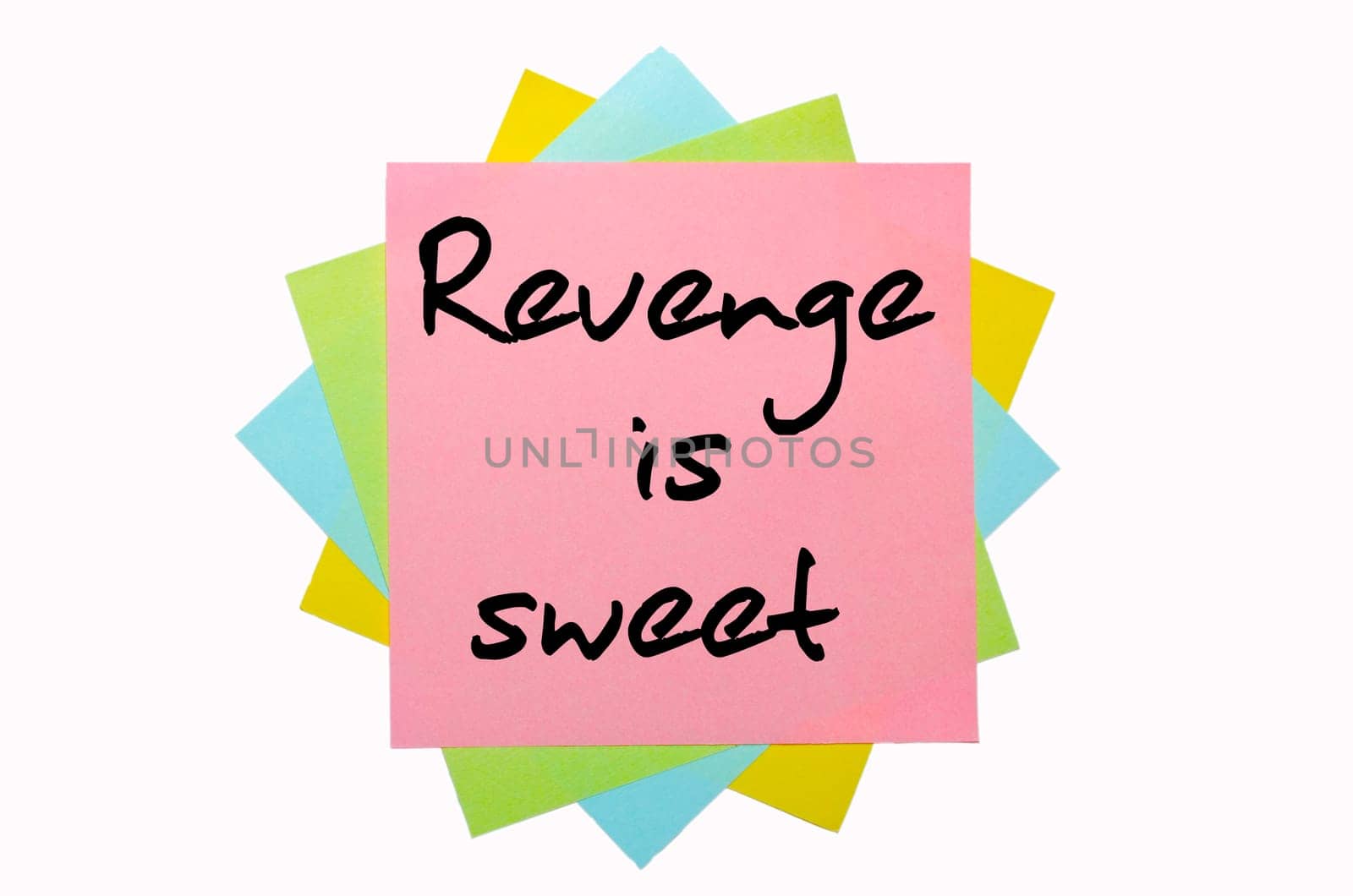 text " Revenge is sweet "" written by hand font on bunch of colored sticky notes"