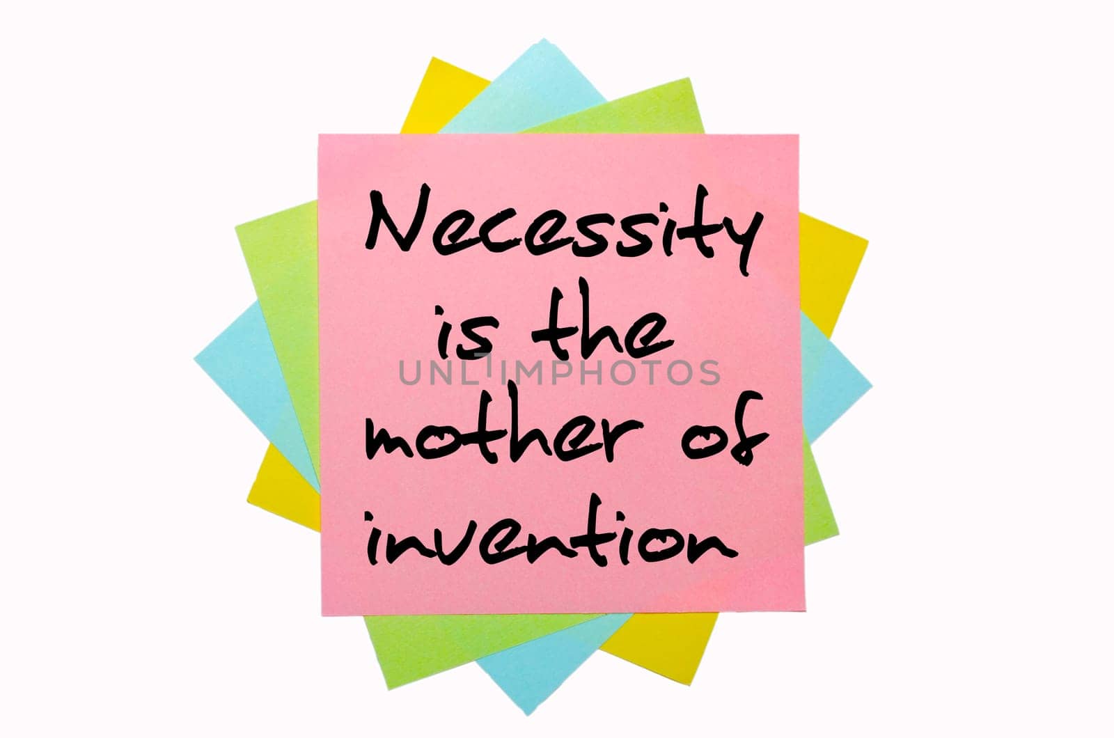 text " Necessity is the mother of invention "" written by hand font on bunch of colored sticky notes"