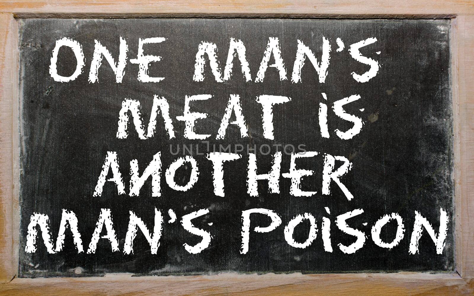 Blackboard writings "One man&#039 s meat is another man&#039 s poison"""