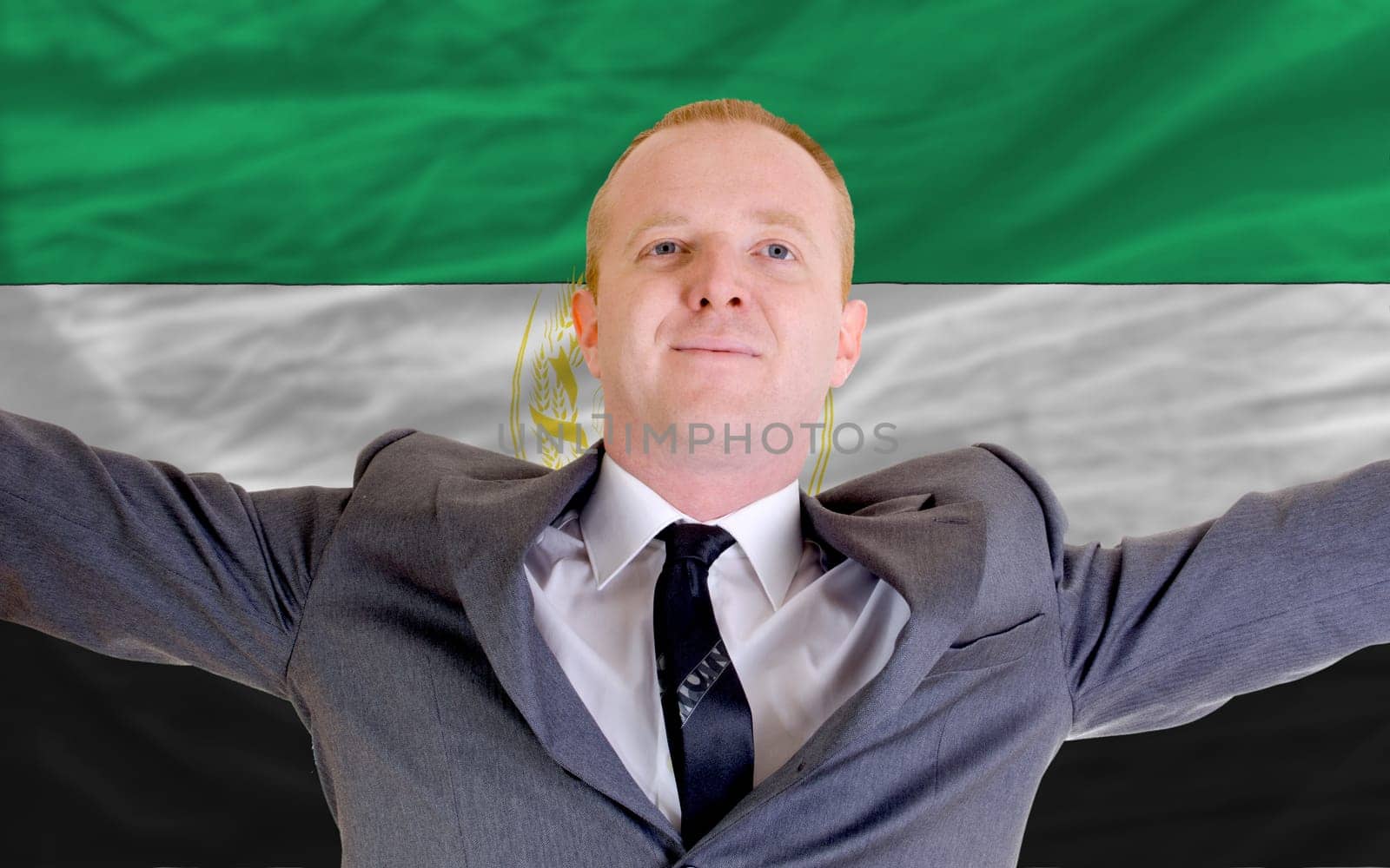 joyful investor spreading arms after good business investment in afghanistan
