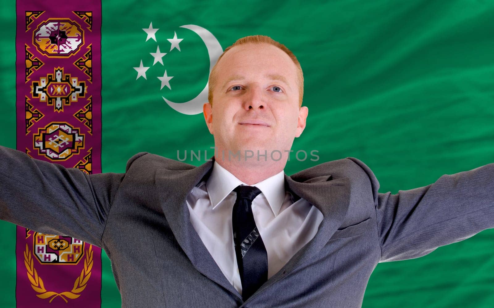 joyful investor spreading arms after good business investment in turkey, in front of flag