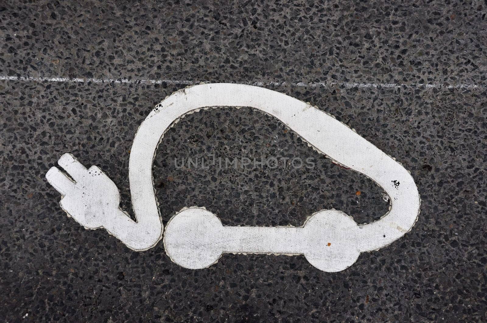 PARIS - NOVEMBER 25: An Autolib&#039  symbol painted on the tarmac on November 25, 2011 in Paris, France. Autolib&#039  is a car-sharing scheme which will be launched in December.