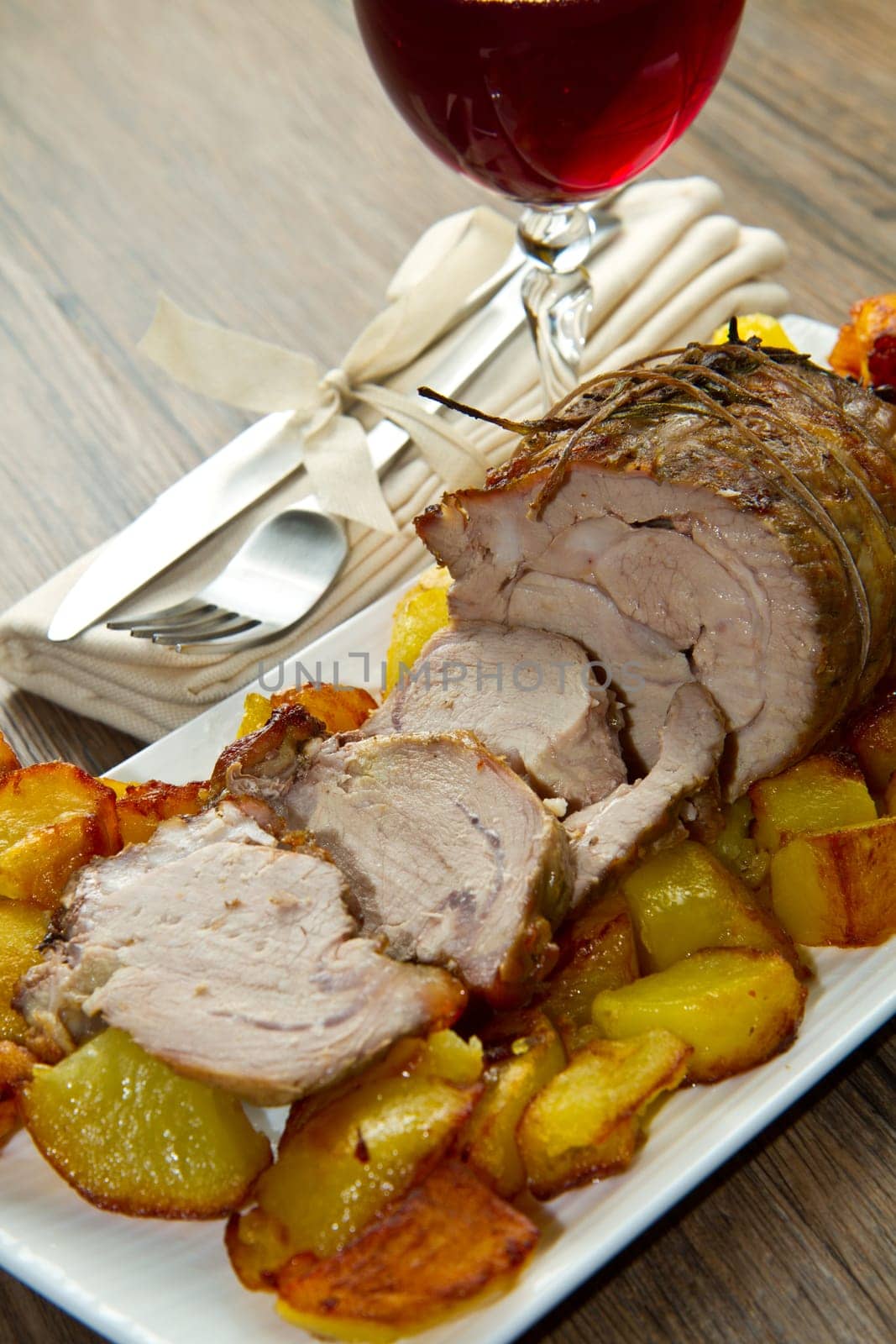 roast beef sliced with potatoes