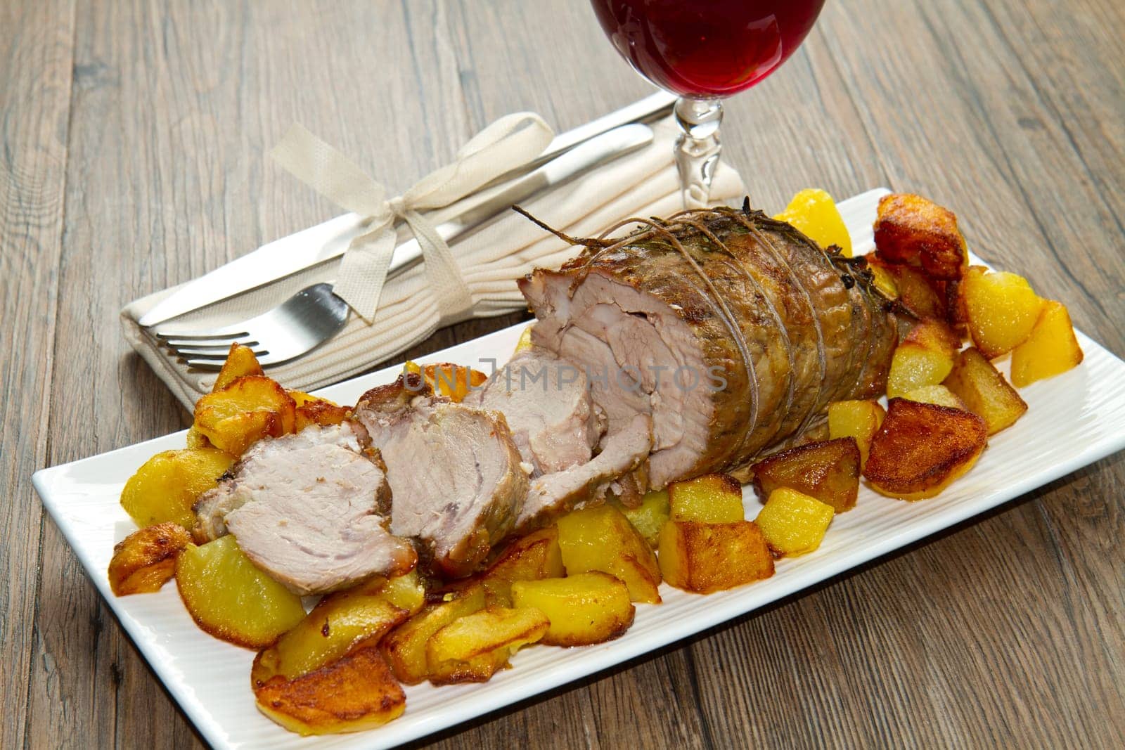 roast beef sliced with potatoes