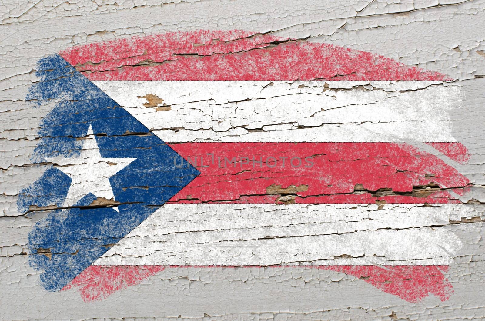 Chalky puertorican flag painted with color chalk on grunge wooden texture
