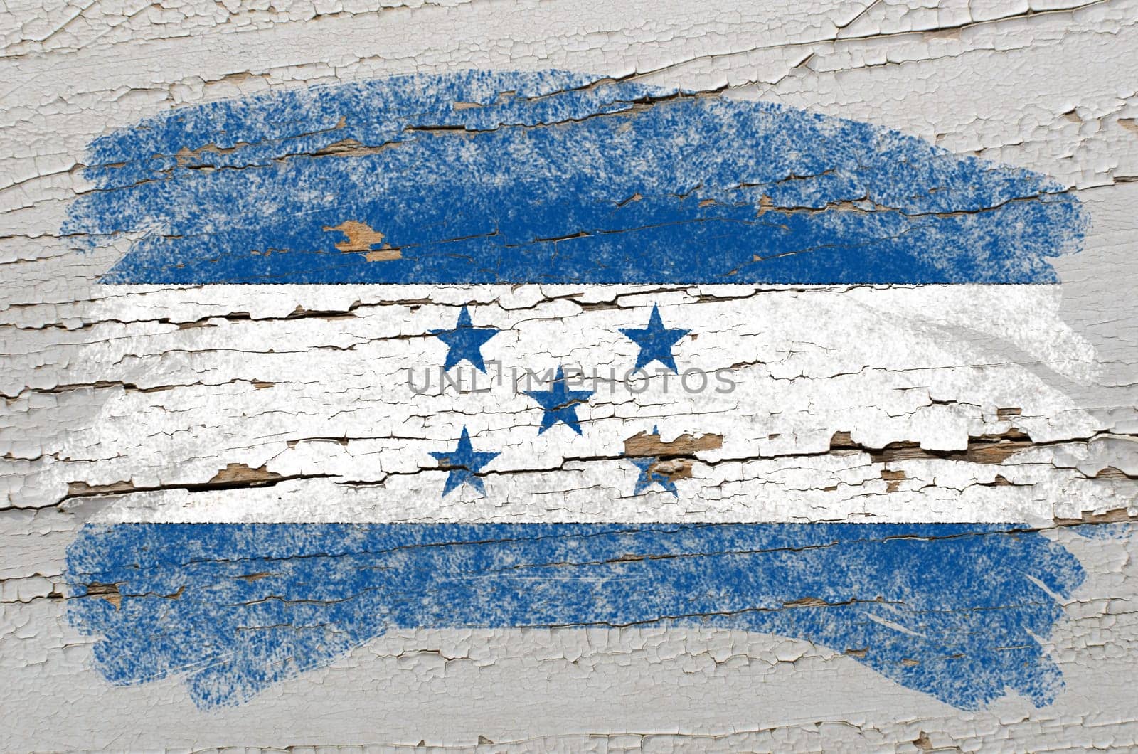 Chalky honduras flag painted with color chalk on grunge wooden texture